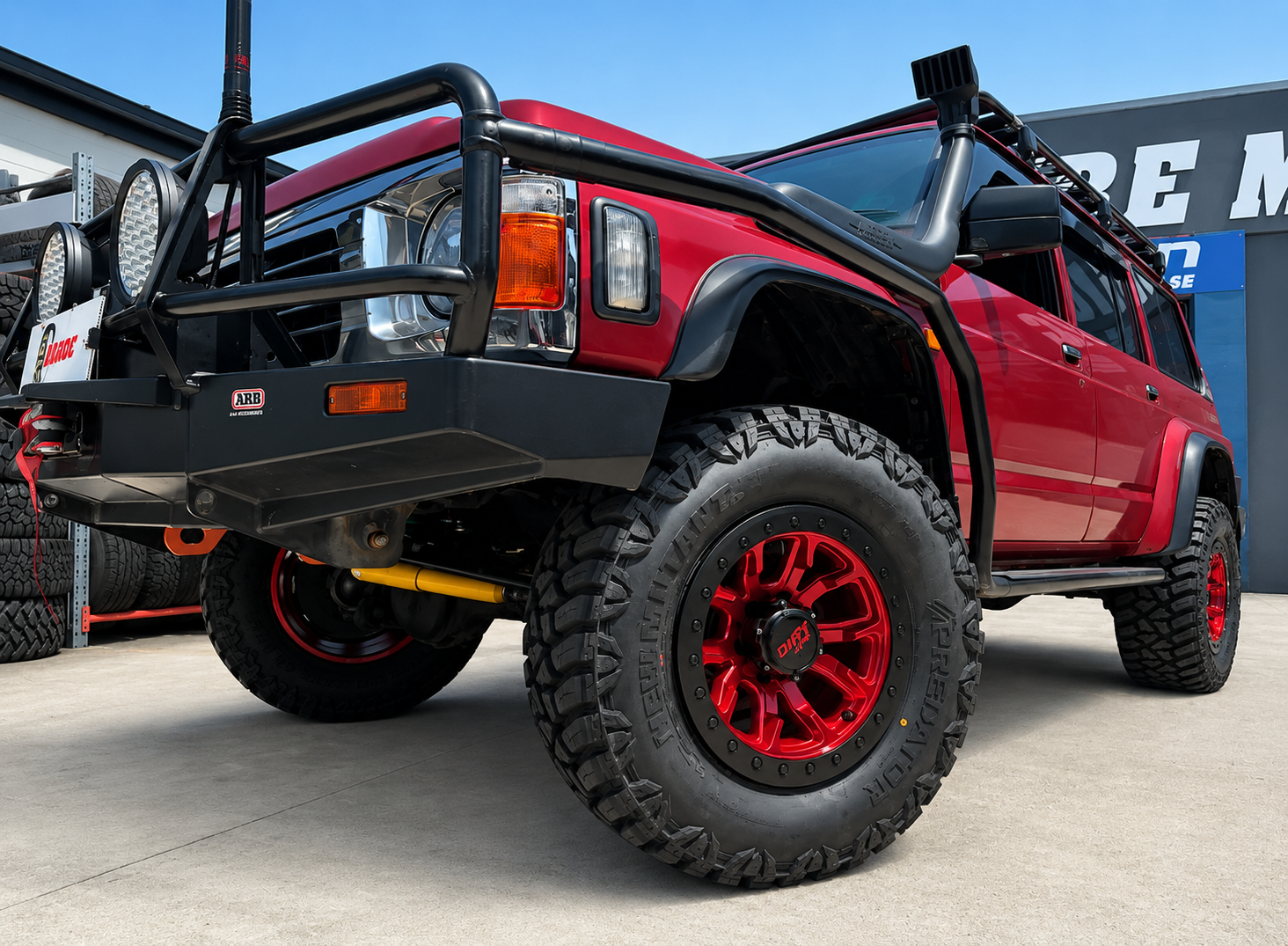 Nissan Patrol GQ - Dirty Life DT1 Candy Red - Predator New Mutant XMT